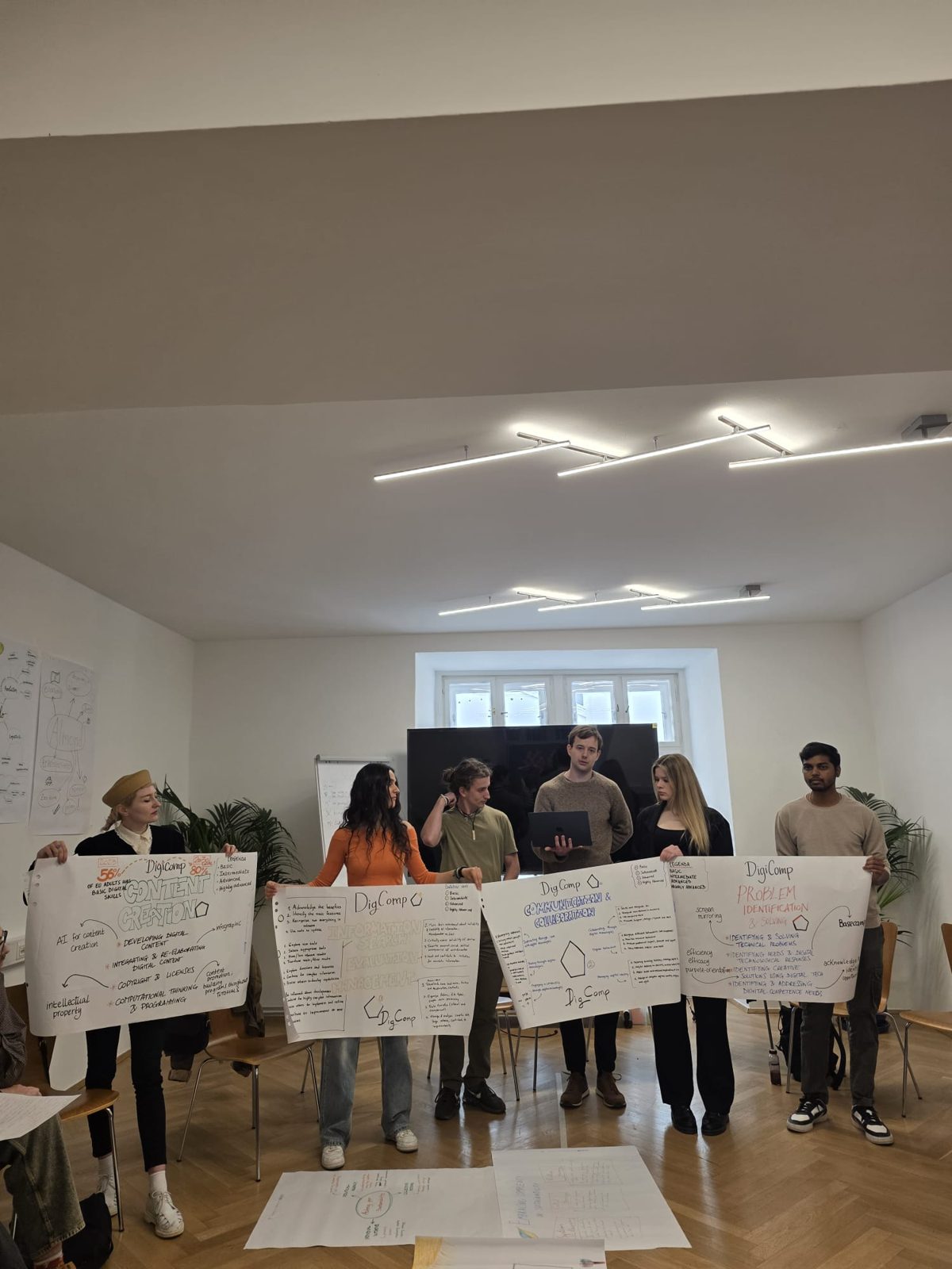 Young people presenting posters during a workshop in our seminar room